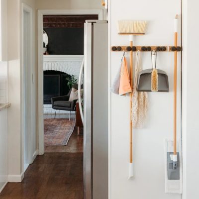 get a gripper to organize brooms and mops